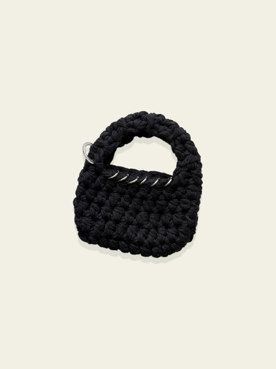 Mini Crochet Bag with Ring Piercings by BYKARYA