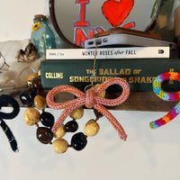 OMBRE KNIT BOW CHARM ACCESSORY ON PHONE AND BOOK COLLABORATION  WITH BYKARYA